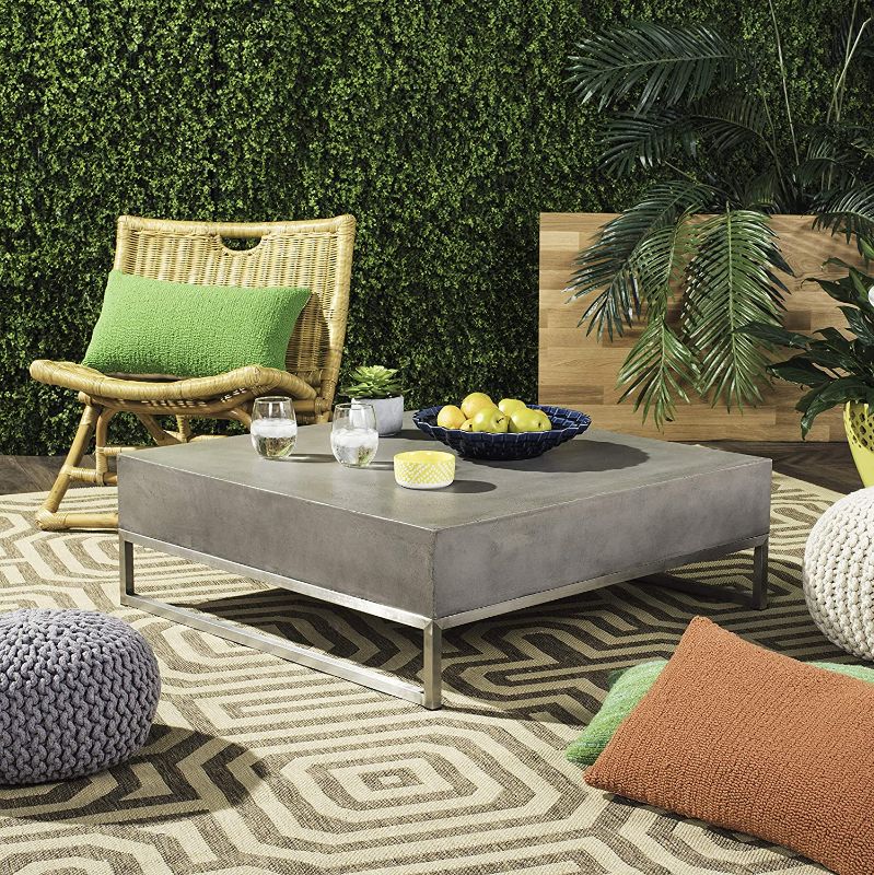 Photo 1 of (MULTIPLE CORNER DENTS AND DAMAGES; SCRATCHED SURFACES; MISSING HARDWARE)
SAFAVIEH Outdoor Collection Eartha Modern Dark Grey Concrete Coffee Table, 34.3"D x 34.3"W x 11.4"H
