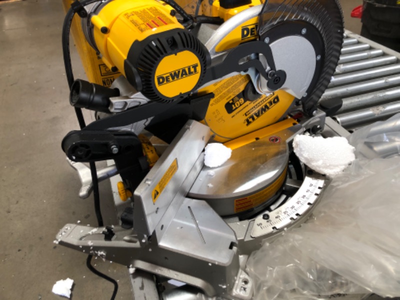 Photo 3 of (DAMAGED FRAME: see photo)
DEWALT 12" 15Amp Dual Bevel Compound Miter Saw
