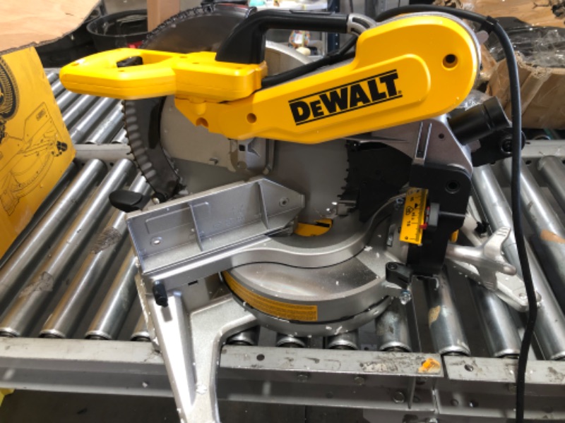 Photo 2 of (DAMAGED FRAME: see photo)
DEWALT 12" 15Amp Dual Bevel Compound Miter Saw
