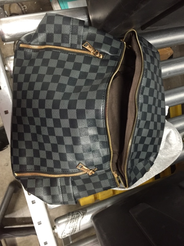Photo 1 of BLACK AND GREY CHECKERED CHIC BACKPACK