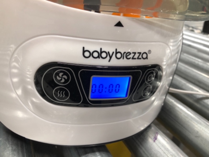 Photo 3 of Baby Brezza Baby Bottle Sterilizer and Dryer Machine – Electric Steam Sterilization - Universal Fit - Pacifiers, Glass, Plastic, and Newborn Feeding Bottles
