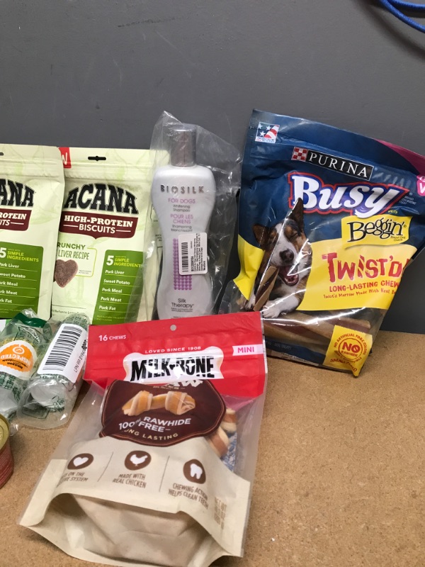 Photo 1 of **NON-REFUNDABLE**
PET BUNDLE
2 BAGS OF DOG TREATS, 2 BAGS OF DOG RAWHIDE, DOG SHAMPOO, FISH FOOD, CAT TREATS, DOG TOY, HAMSTER HOUSE