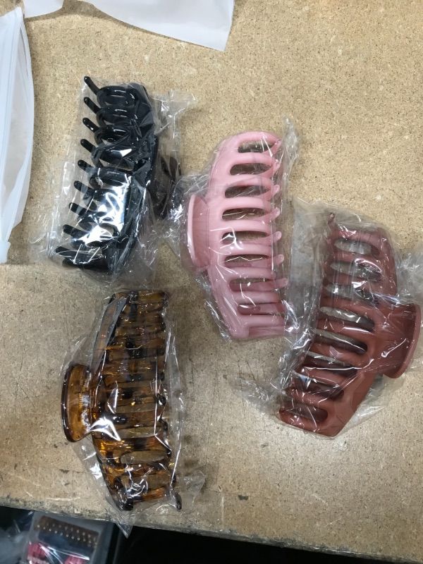 Photo 2 of ** SETS OF 4**
4 pcs Crystal Plastic Hair Claw Clips, Nonslip Large Girls Hair Claw Clips Jaw for Women and Girls Thin Hair, Strong Hold for Thick Hair(4.3 Inch Bright black, yellow, pink, orange)