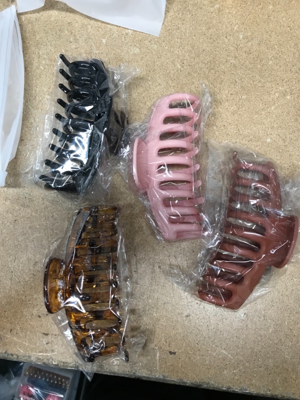 Photo 2 of ** SETS OF 4**
4 pcs Crystal Plastic Hair Claw Clips, Nonslip Large Girls Hair Claw Clips Jaw for Women and Girls Thin Hair, Strong Hold for Thick Hair(4.3 Inch Bright black, yellow, pink, orange)
