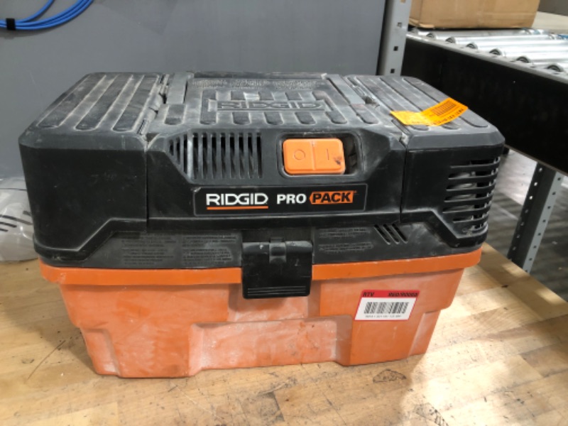 Photo 5 of **PARTS ONLY : DOESNT TURN ON, missing attachments** RIDGID 4.5 Gallon 5.0-Peak HP ProPack Wet/Dry Shop Vacuum with Fine Dust Filter, Expandable Hose and Accessories