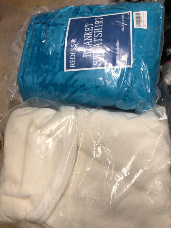 Photo 1 of *size not specified*
blue redress blanket sweater and white bathrobe