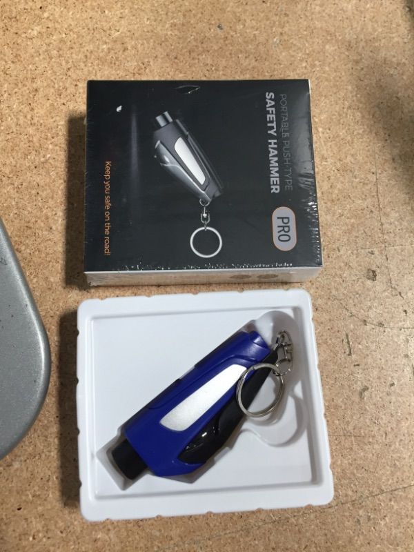 Photo 2 of **set of 2**
RUNKOL Original Glass Breaker, Two-in-one seat Belt Cutter and Window Breaker, Keychain Emergency Escape Tool (Blue)
