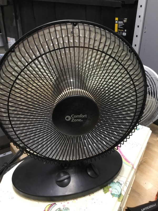 Photo 2 of Comfort Zone
700/1000-Watt Oscillating Parabolic Dish Radiant Electric Portable Heater