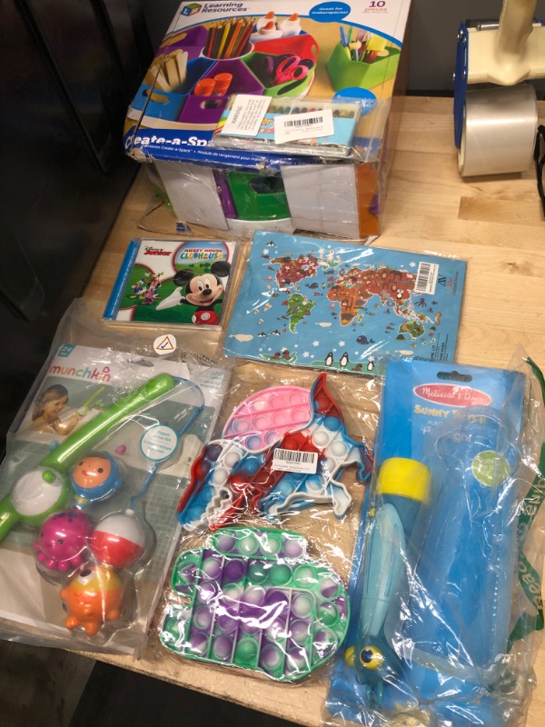 Photo 1 of **NONREFUNDABLE BUNDLE OF KIDS TOYS, GAMES AND STORAGE**SOLD AS IS