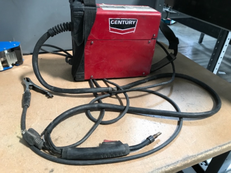 Photo 2 of **SEE PICTURES FOR DAMAGE** Century 90 Amp FC90 Flux Core Wire Feed Welder and Gun, 120V