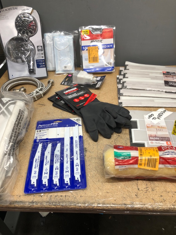 Photo 2 of **NON-REFUNDABLE**
HOUSE HOLD GOODS
PAINT ROLLER,20 PACK TERRY TOWLES, GREASE MONKEY GLOVES, BI-METAL BLADES, LED 26 WATT LIGHT BULB, HAND HELD SHOWER HEAD, SLASH GAURDS, FACE MASK 