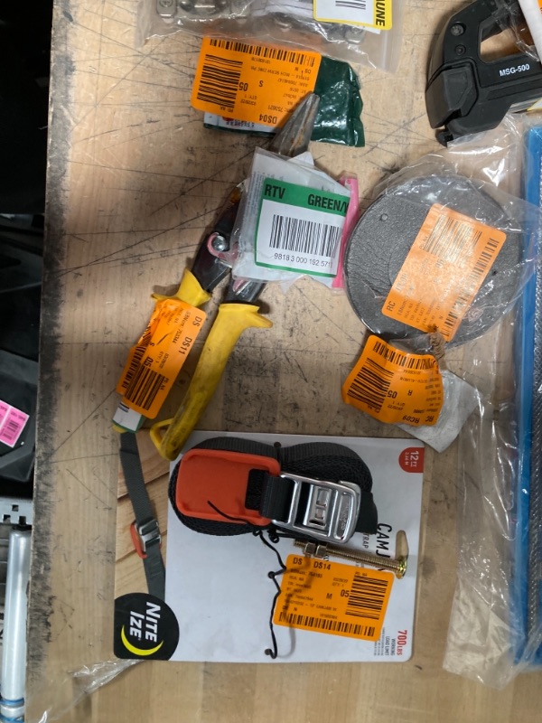Photo 1 of **NON-REFUNDBALE** 
Home Depot Miscellaneous , Switches, Garden, pipes, tubing, screws, metal filter and tool items. 
