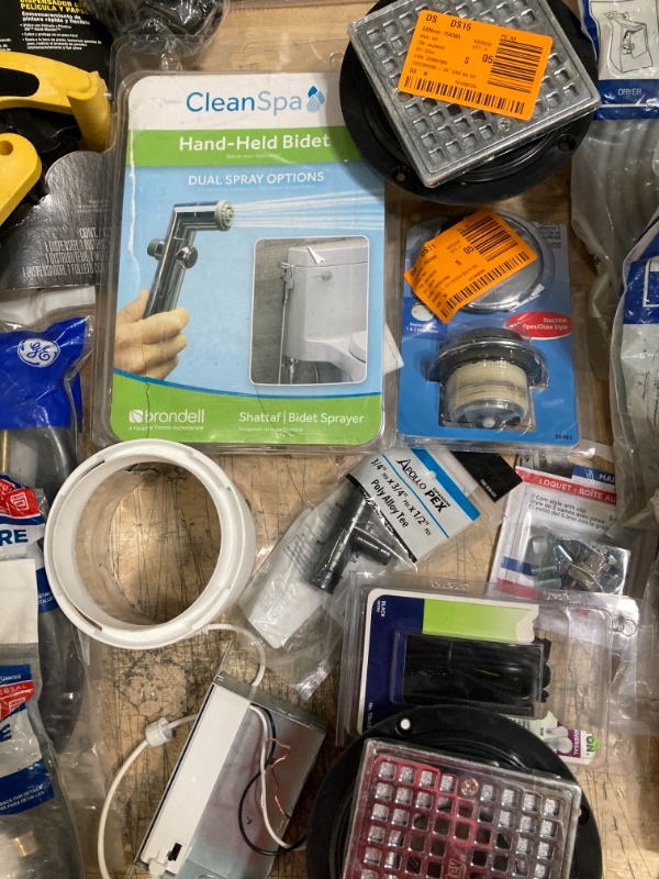 Photo 8 of **NON-REFUNDBALE** 
Miscellaneous Home Depot Items, Assorted Bath and shower Supplies, Dryer Cords, Bath Spouts, Fuzes, locks, Drain Openings 