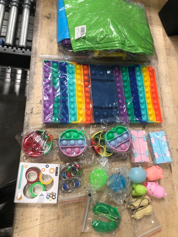 Photo 1 of **NOT REFUNDABLE** BUNDLE OF ASSORTED MISC Amazon toys
Water toys, sensory fidget toys