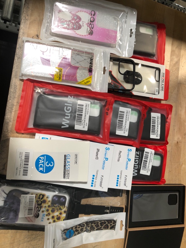 Photo 1 of **NOT REFUNDABLE** BUNDLE OF ASSORTED MISC Phone cases, and tech items
Samsung and iPhone cases, screen glass protectors, Apple watch bands
