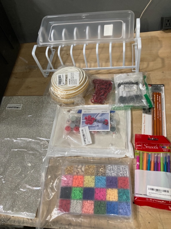 Photo 1 of **NON-REFUNDABLE** Home and Office Goods; Drying rack, Insulating Seal, Lanyards, Pencils, Paint set, Glitter Stickers and Beads 