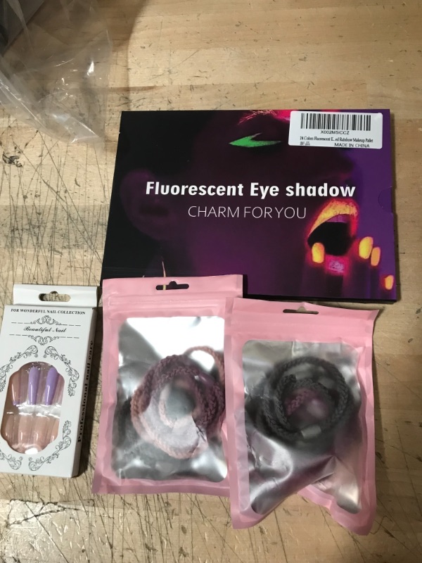 Photo 1 of BUNDLE OF BEAUTY PRODUCTS, FAKE NAILS/HAIR BANDS/EYE SHADOW