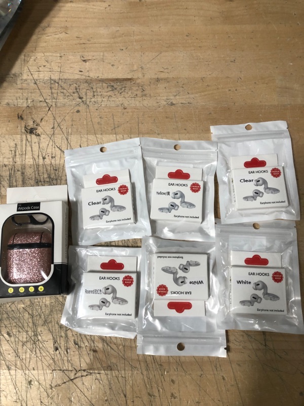 Photo 1 of BUNDLED BAG OF EAR HOOKS/AIRPOD CASE 
