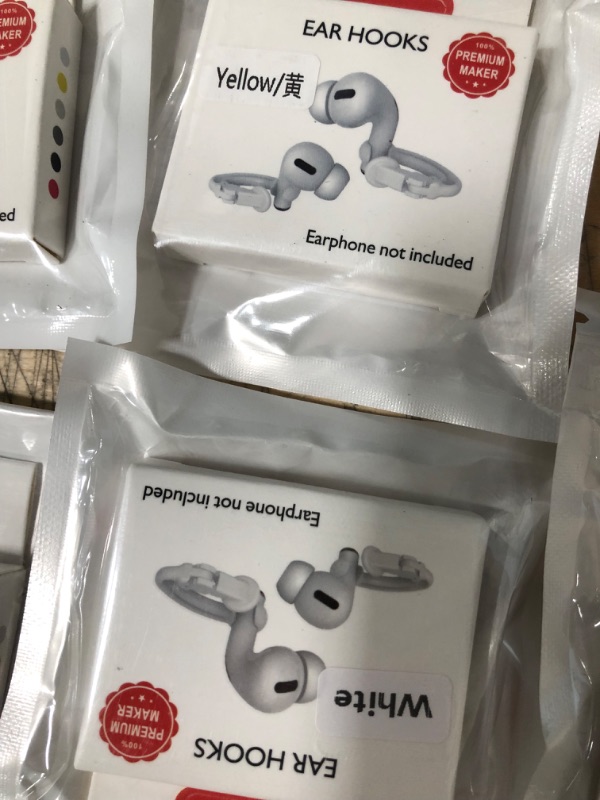 Photo 1 of BUNDLED BAG OF EAR HOOKS/AIRPOD CASE 