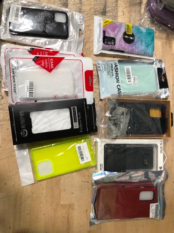 Photo 1 of ASSORTED BAG OF PHONE CASES FOR IPHONE/SAMSUNG 