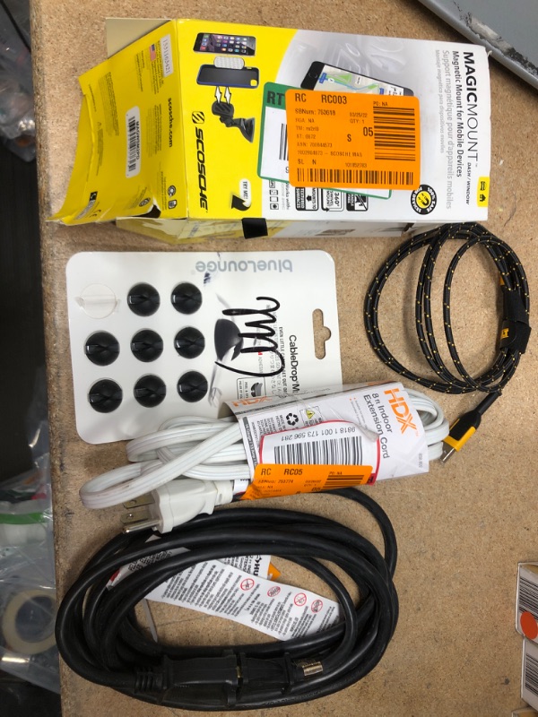 Photo 1 of **NO REFUNS/RETURNS** - Bundle of Miscellaneous cables/extensions, device mount 