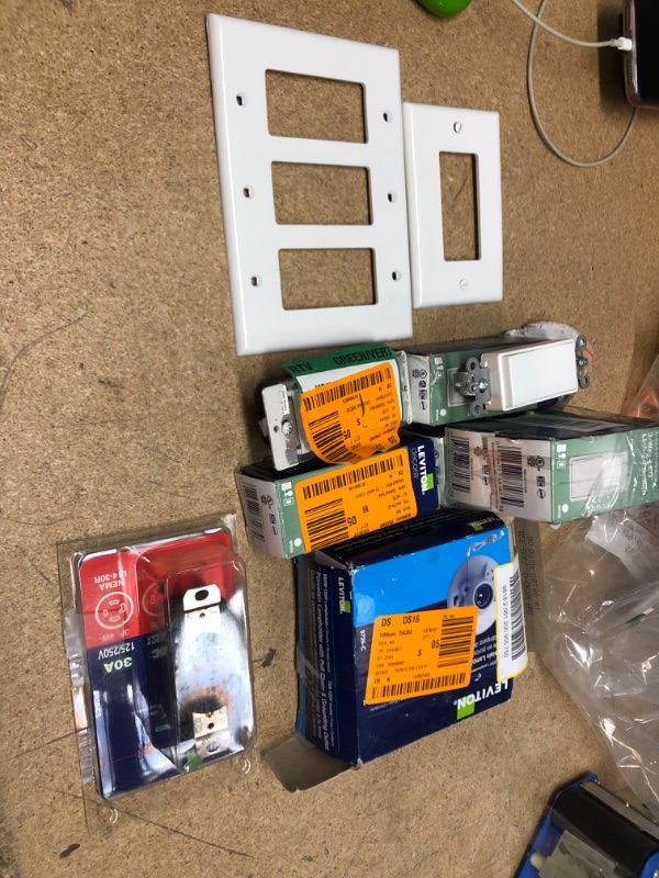 Photo 1 of **NO REFUNDS/RETURNS** - Bundle of assorted wall plates, light switches