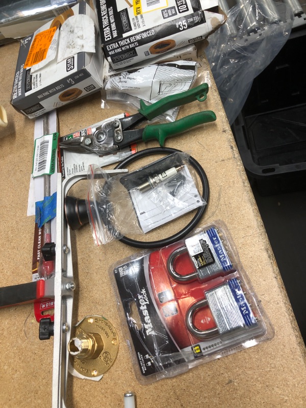 Photo 1 of **NO REFUNDS/RETURNS** - Bundle of Miscellaneous Home Depot goods: wax rings (3), master lock, diablo, tools