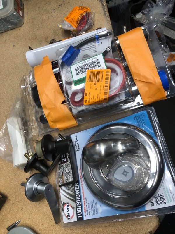 Photo 1 of **NO REFUNDS/RETURNS** - Bundle of Miscellaneous Home Depot Goods: tub shower kit, door handles, etc. 