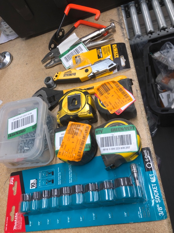 Photo 1 of **NO REFUNDS/RETURNS** - Bundle of Miscellaneous Home Depot Goods: tape measures, screws, dewalt tools