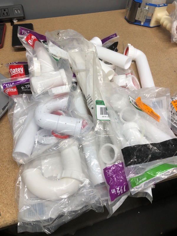 Photo 1 of **NO REFUNDS/RETURNS** - Bundle of Miscellaneous Home Depot plastic drain pipes