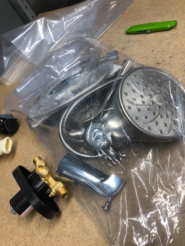 Photo 1 of **NO REFUNDS/RETURNS** - Bundle of Miscellaneous Home Depot Shower Heads and faucet 