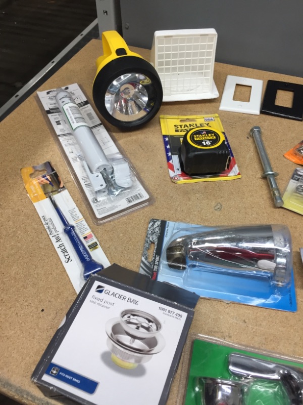 Photo 1 of ***non-refundable***
assorted household goods
flash light, tape measure, dog run cable, plumbing items