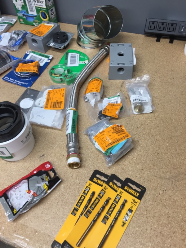 Photo 1 of **non-refundable**
assorted household goods
plumbing home repair items, drill bits, gloves, light switches, paint marker