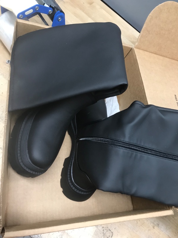 Photo 1 of Pair of size 38 black boots 