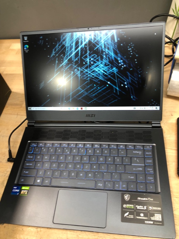 Photo 3 of MSI Stealth 15M Gaming Laptop: 15.6" 144Hz FHD 1080p Display, Intel Core i7-11375H, NVIDIA GeForce RTX 3060, 16GB, 512GB SSD, Thunderbolt 4, WiFi 6, Win10, Carbon Gray (A11UEK-009)
