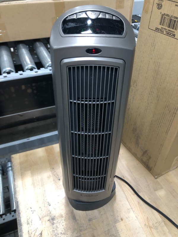 Photo 2 of Lasko 755320 Ceramic Space Tower Heater, 8.5?L x 7.25?W x 23?H, Silver
