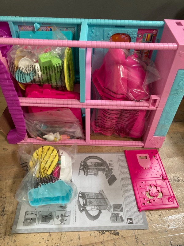 Photo 2 of Barbie Chelsea Playhouse (~20-in) Transforming Dollhouse with Slide, Pool, Ball Pit, Pet Puppy & Kitten, Elevator, 15+ Accessories, Gift for 3 to 7 Year Olds
