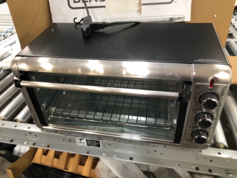Photo 2 of ** DAMAGED ON THE BOTTOM** BLACK+DECKER TO3240XSBD 8-Slice Extra Wide Convection Countertop Toaster Oven, Includes Bake Pan, Broil Rack & Toasting Rack, Stainless Steel/Black Convection Toaster Oven
