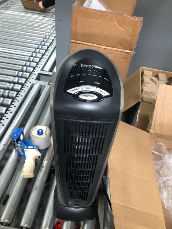 Photo 2 of **INCOMPLETE**
Lasko Lasko-22 Digital Ceramic Oscillating Remote (751320) Tower Heater, 8.5x2033 L x 7.25x2033 W x 23x2033 H, Grey/Black
