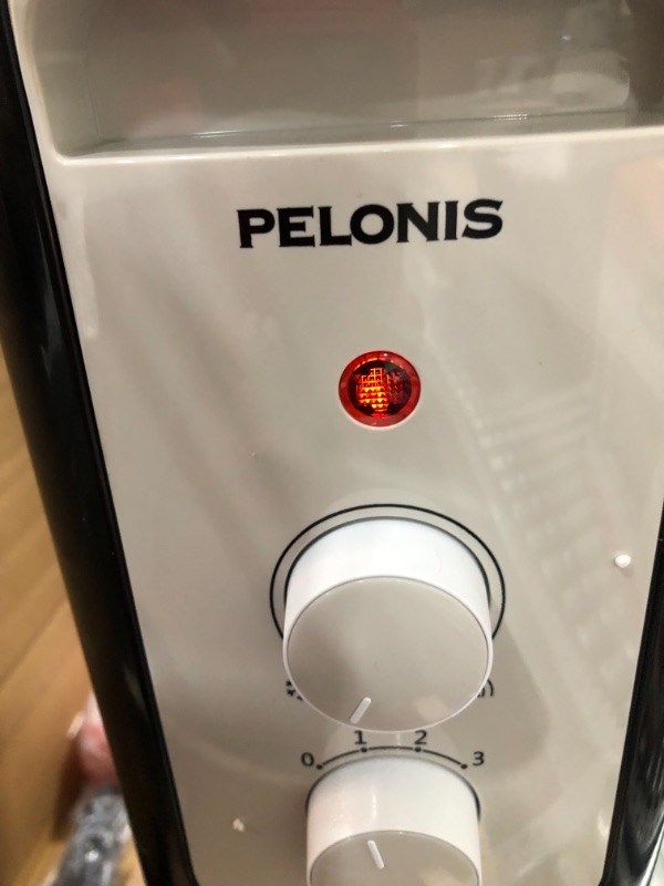 Photo 1 of Pelonis
1,500-Watt Oil-Filled Radiant Electric Space Heater with Thermostat