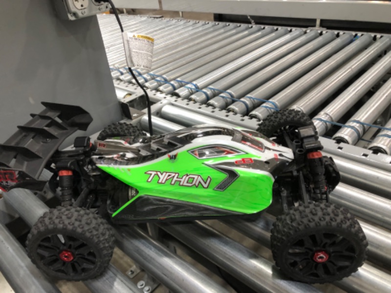 Photo 1 of ARRMA 1/10 Typhon 4X4 V3 MEGA 550 Brushed Buggy RC Truck RTR (Transmitter, Receiver, NiMH Battery and Charger Included), Green, ARA4206V3
