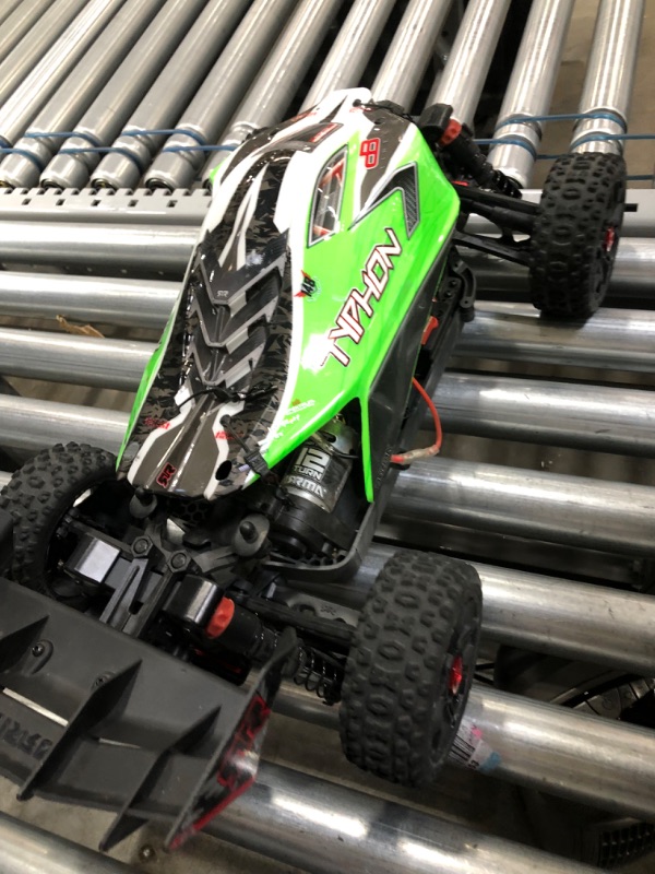 Photo 4 of ARRMA 1/10 Typhon 4X4 V3 MEGA 550 Brushed Buggy RC Truck RTR (Transmitter, Receiver, NiMH Battery and Charger Included), Green, ARA4206V3
