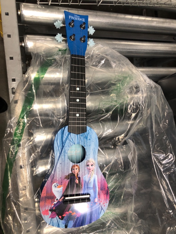 Photo 2 of First Act Discovery Frozen 2 Ukulele (Small Kids Guitar with Four Strings)
