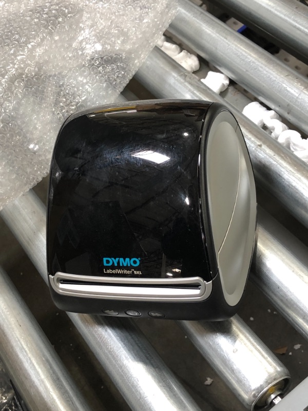 Photo 1 of DYMO LabelWriter 5XL Label Printer, Automatic Label Recognition, Prints Extra-Wide Shipping Labels (UPS, FedEx, USPS) from Amazon, eBay, Etsy, Poshmark, and More, Perfect for eCommerce Sellers
