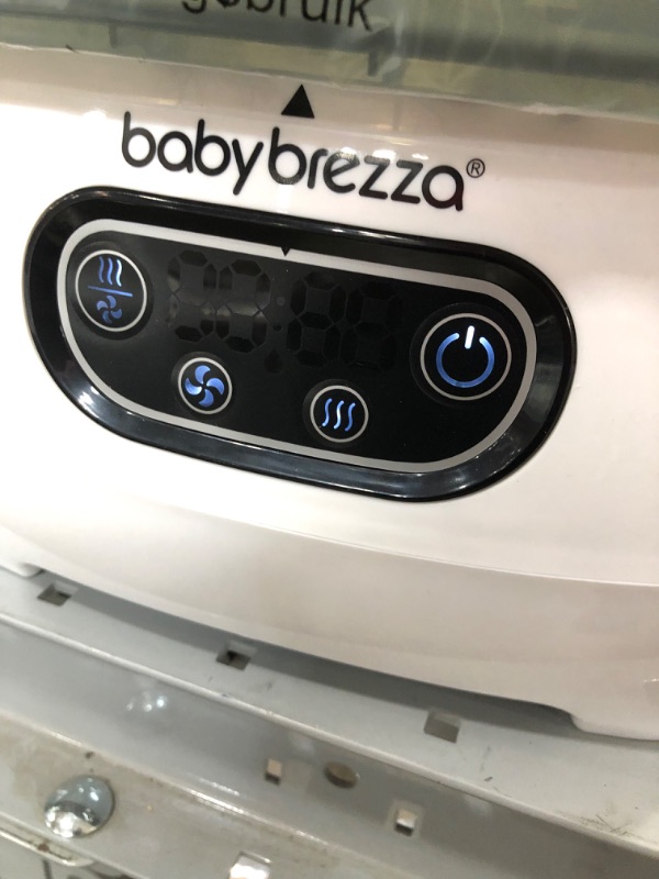 Photo 3 of Baby Brezza Sterilizer & Dryer Advanced, Effective Steam Sterilization, HEPA Filter, Dries 33% Faster, Highest Capacity, Holds 8 Bottles & 2 Pump Part Sets from Any Brand, Universal Fit, White
