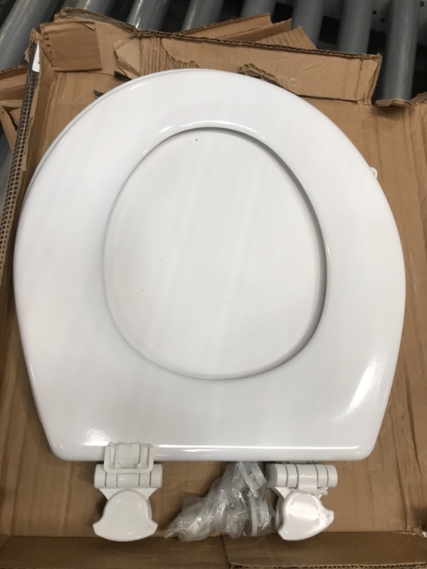 Photo 2 of **DAMAGED**
Bemis Round Enameled Wood Toilet Seat in Cotton White with Easy•Clean Hinge
