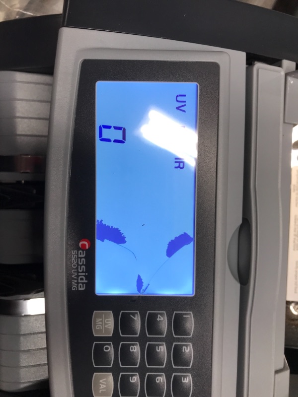 Photo 3 of **DAMAGED**
Cassida 5520 UV/MG - USA Money Counter with ValuCount, UV/MG/IR Counterfeit Detection, Add and Batch Modes - Large LCD Display & Fast Counting Speed 1,300 Notes/Minute
