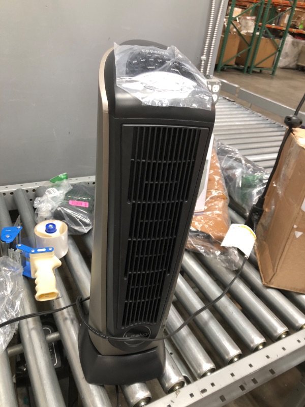 Photo 2 of **INCOMPLETE**
Lasko Lasko-22 Digital Ceramic Oscillating Remote (751320) Tower Heater, 8.5x2033 L x 7.25x2033 W x 23x2033 H, Grey/Black
