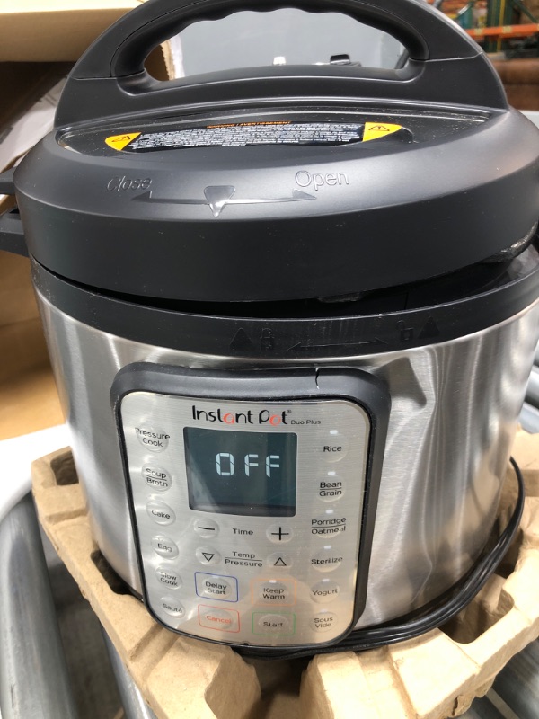 Photo 2 of **HAS DENT** Instant Pot Duo Plus 8 qt 9-in-1 Slow Cooker/Pressure Cooker
USED