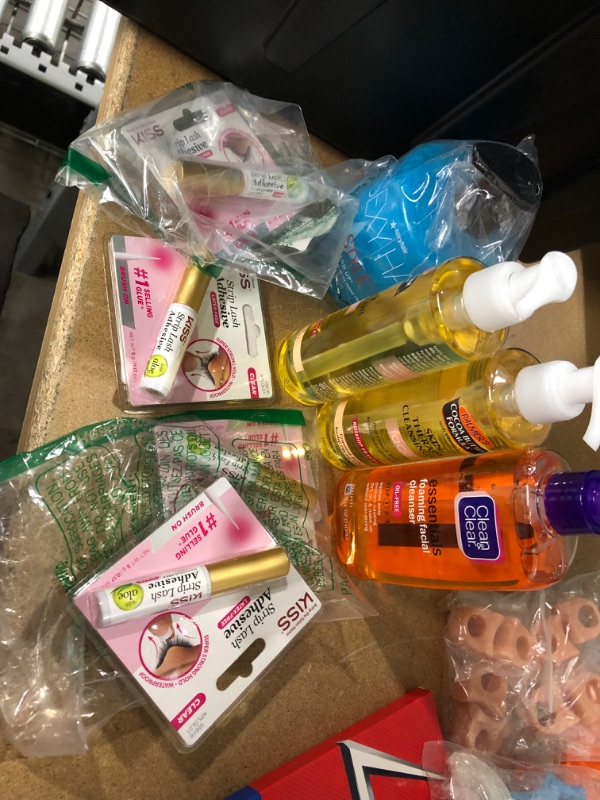 Photo 1 of BAG OF ASSORTED SELF CARE ITEMS 
**NOT REFUNDAVLE, SOLD AS IS**